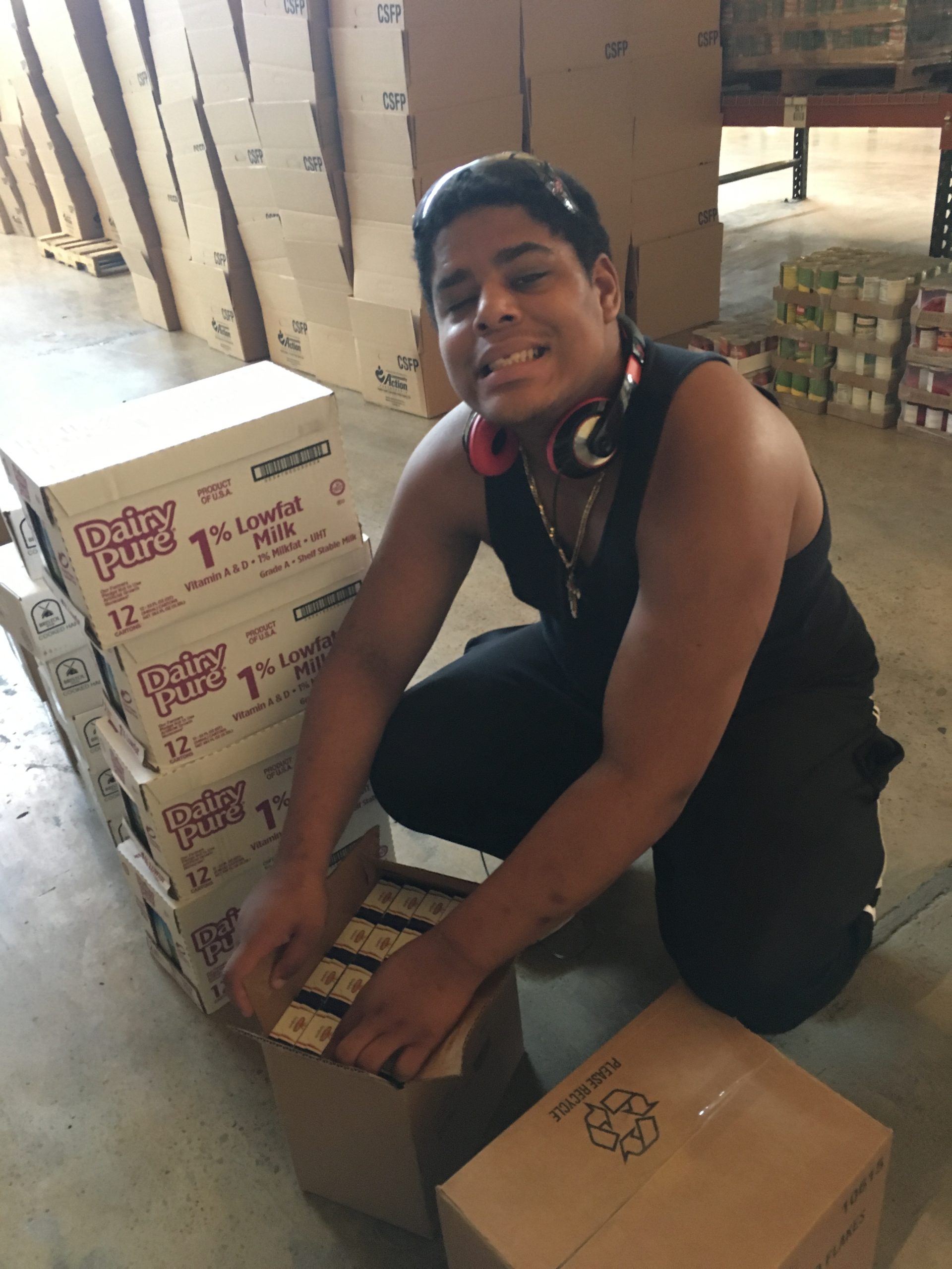 IMG_0269 - The Arc Fayette participant packing milk boxes