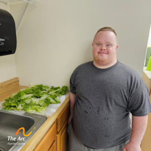 4 Ryan preparing a fresh lettuce salad from the ATF garden