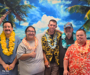 Five guys posing in front of beach backdrop