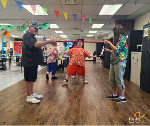Adult Training Facility (ATF) participant playing limbo