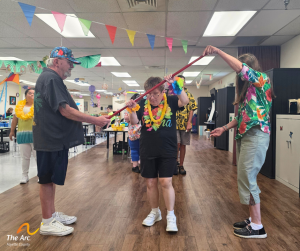 Adult Training Facility (ATF) participant playing limbo