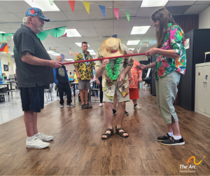 Adult Training Facility (ATF) participant playing limbo